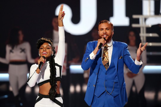 LOS ANGELES, CA - JUNE 28:  Recording artists Janelle Monae (L) and Jidenna perform onstage during the 2015 BET Awards at the Microsoft Theater on June 28, 2015 in Los Angeles, California.  (Photo by Mark Davis/BET/Getty Images for BET)